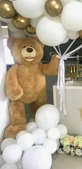 30 gold white Balloon cluster on sticks with 4 foot brown teddy holding balloons and 10 white gold balloons at bottom