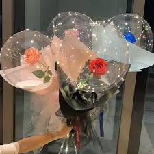 Four Transparent bobo balloons with roses inside and LED Light for anniversary celebration