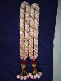 2 garlands with light pink flowers and beads