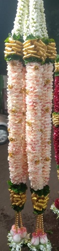 2 garlands with light pink flowers and beads