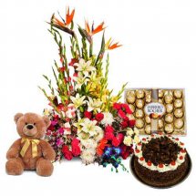 Large exotic flowers in a basket 24 Ferrero 1/2 Kg Black forest cake and 6 inches Teddy bear