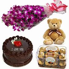 1/2 kg chocolate cake with teddy 6 orchids bouquet and 16 ferrero rocher