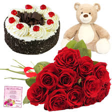 12 red roses with 6 inch Teddy and Half Kg black forest cake