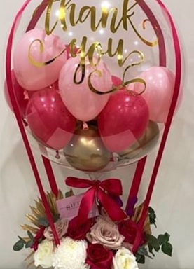 Clear Thank you printed Balloon stuffed with pink red gold balloons and basket of red white flowers