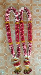 2 garlands with red white flowers gold leaves and beads