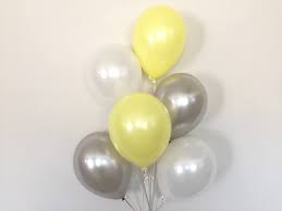 10 Gas filled yellow silver white Balloons tied to ribbons
